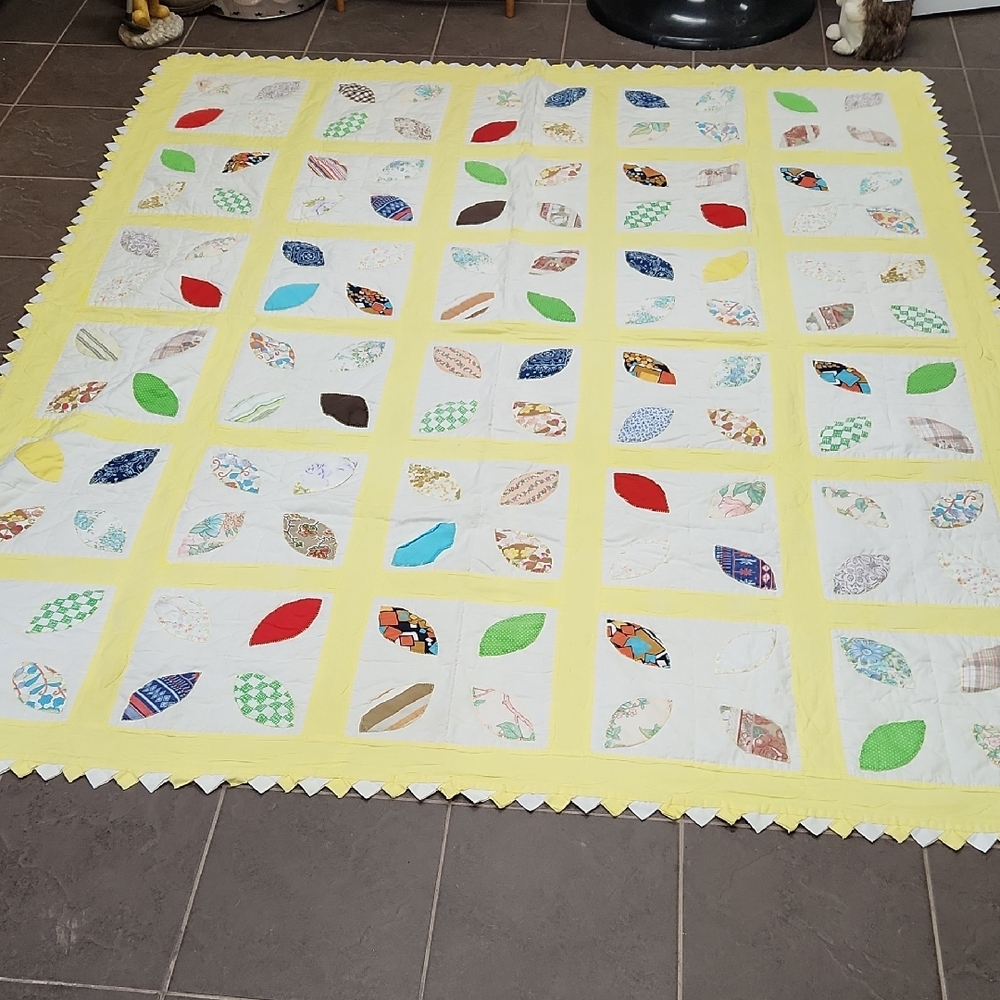 Colorful Patchwork Quilt with Yellow Border